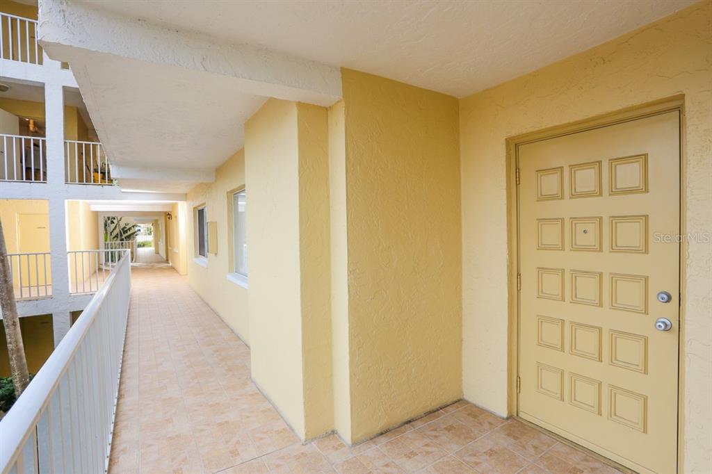 a view of a hallway with a furniture