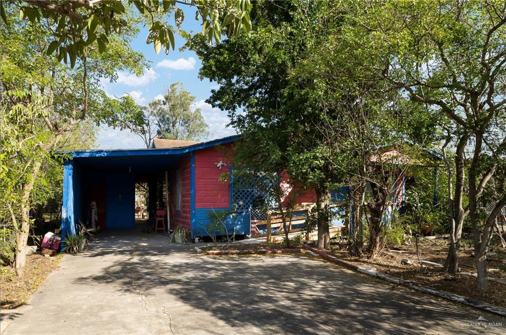 a house with trees in front of it