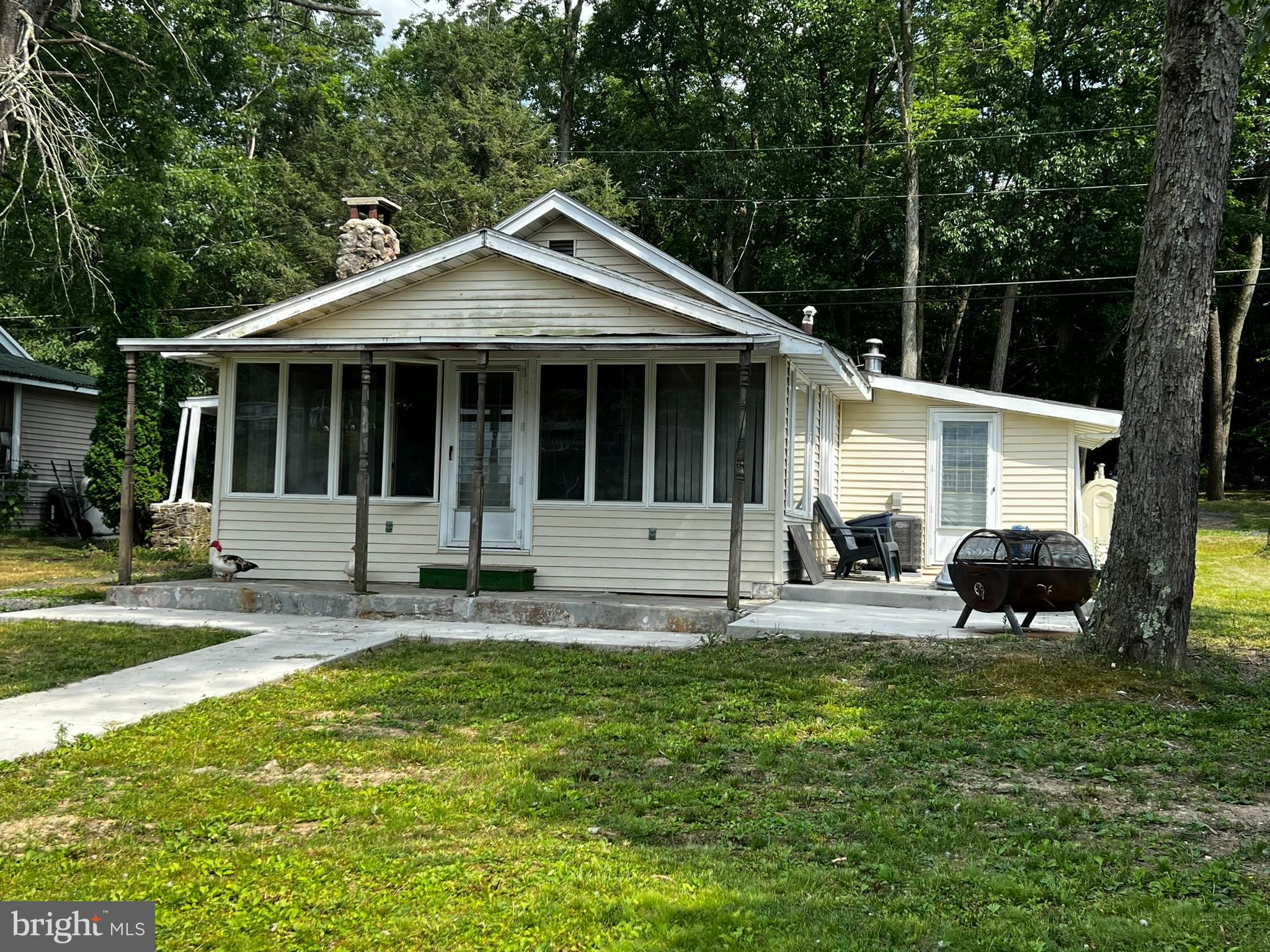 a house view with a garden space