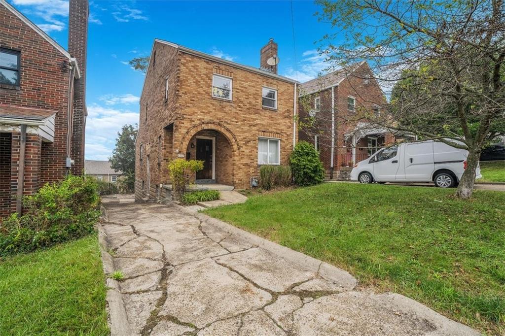 a view of a house with a garden