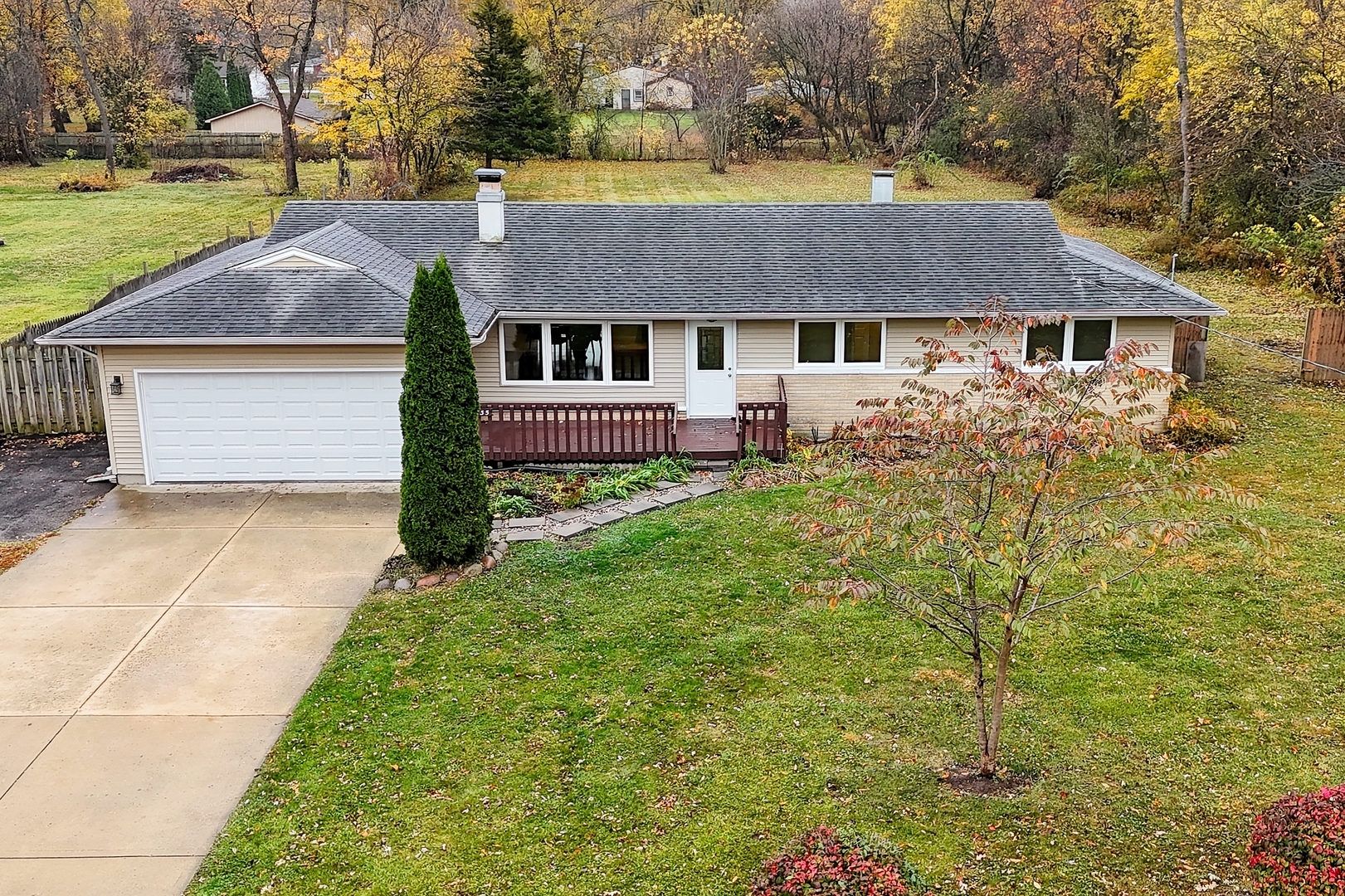 front view of a house with a yard