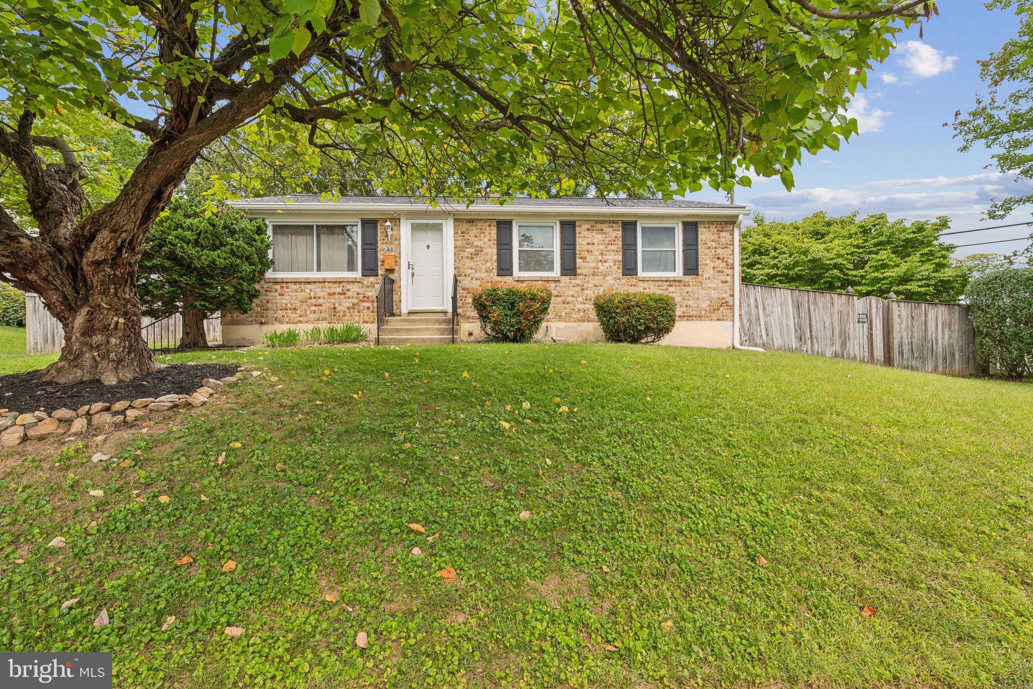 front view of a house and a yard