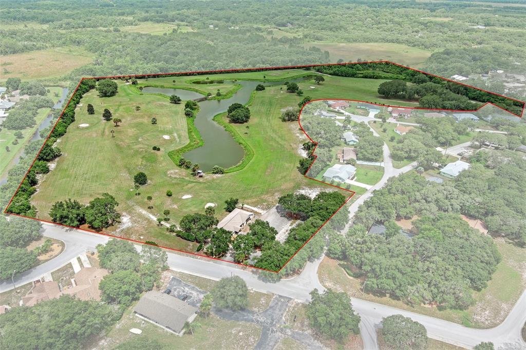 a view of a garden with an outdoor space