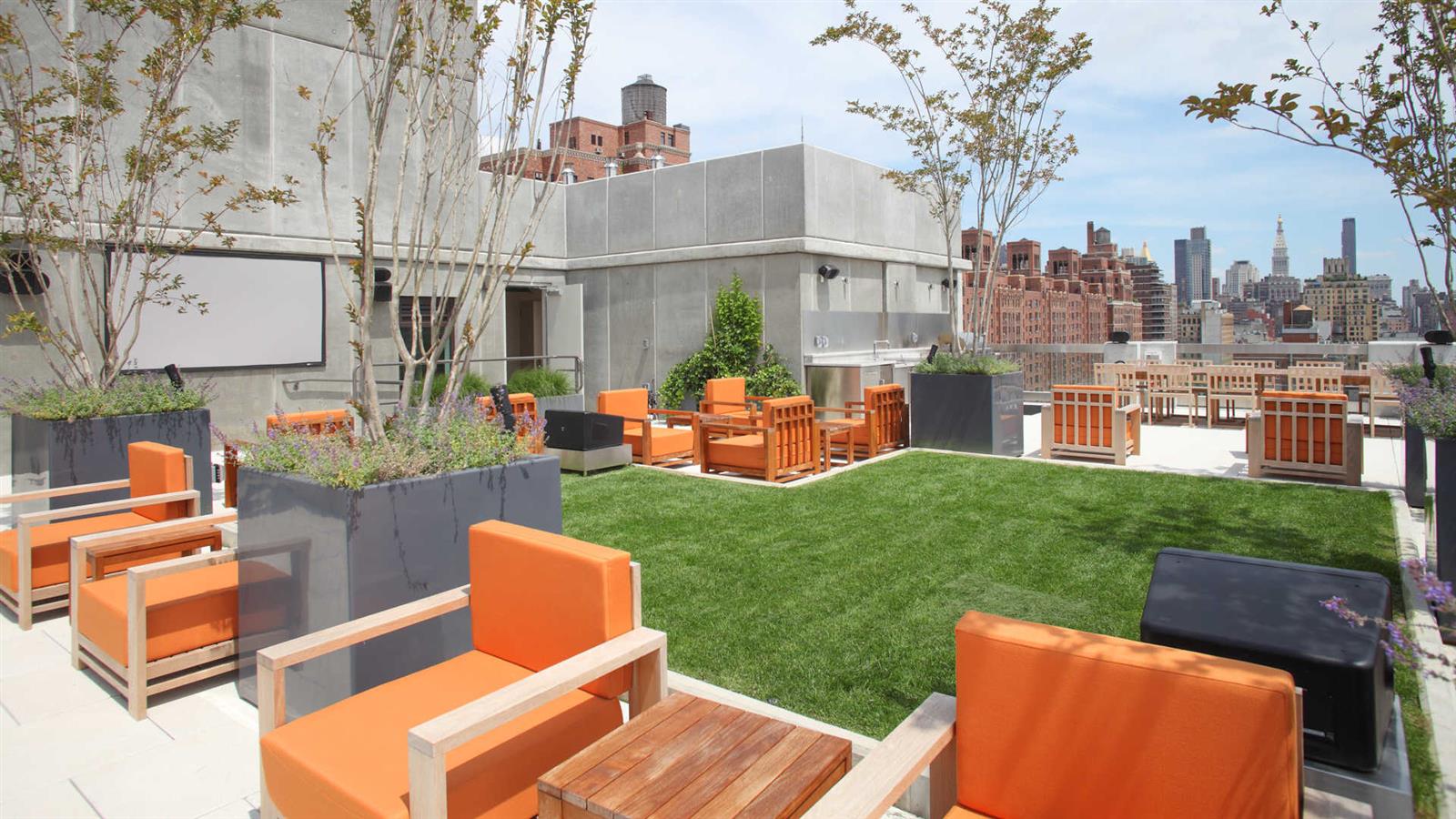 a view of a chairs and table in the back yard of the house