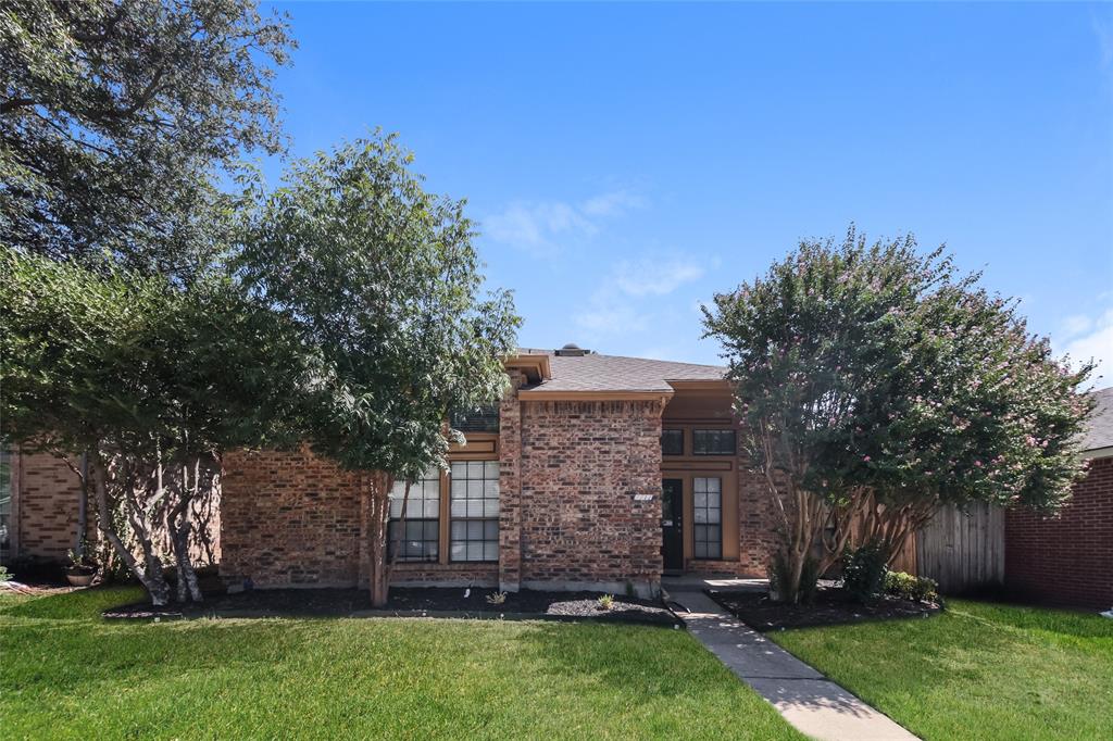 front view of house with a yard