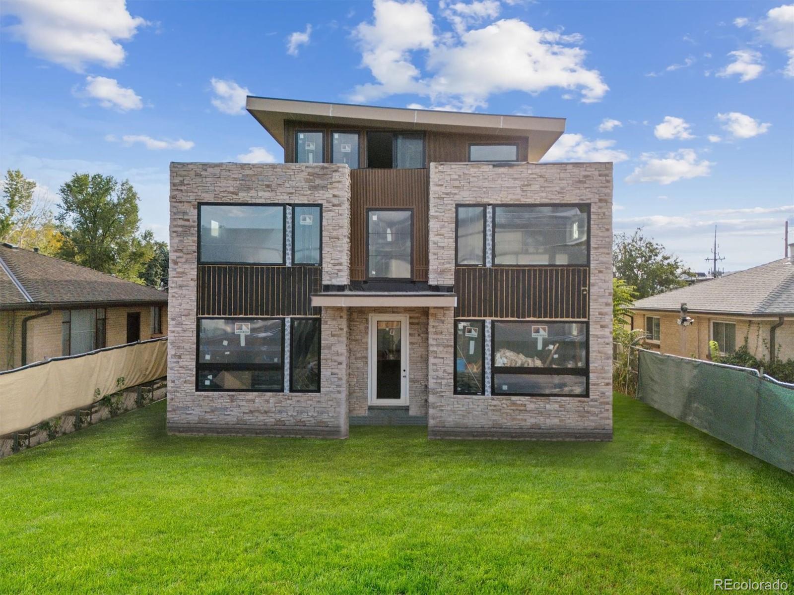 front view of a house with a yard