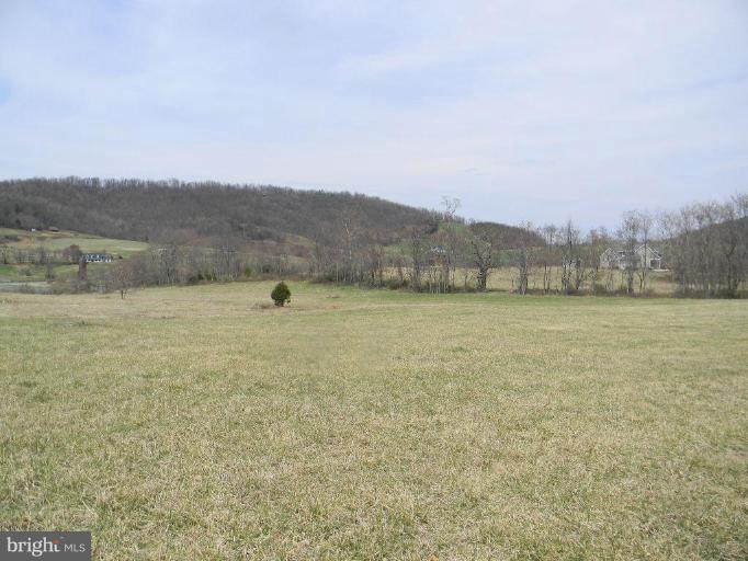 a view of outdoor space with mountain view