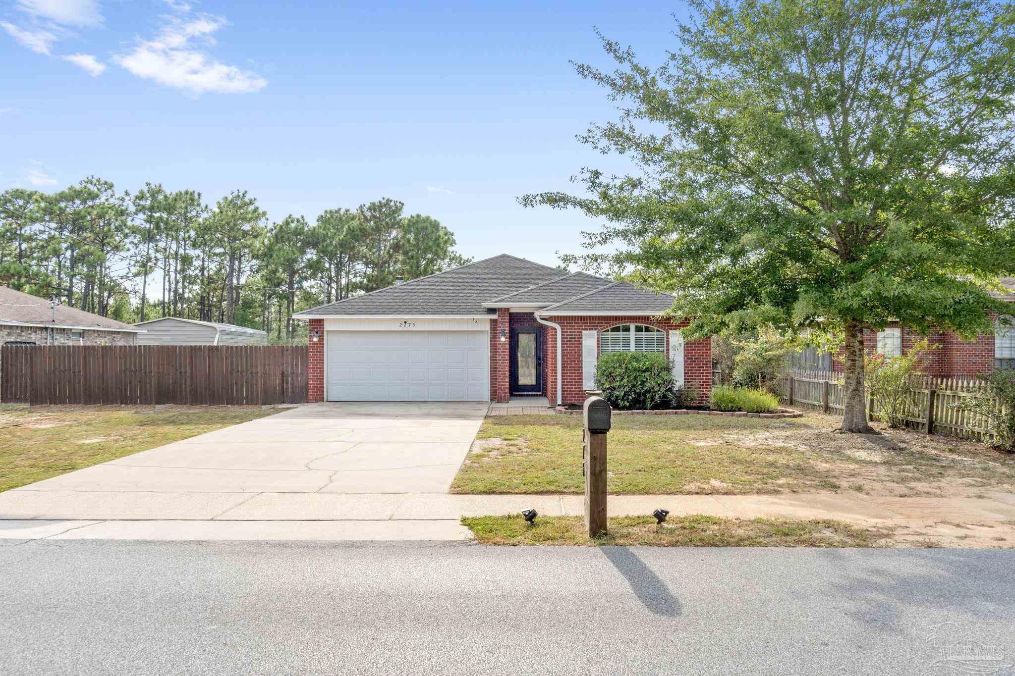 a house with trees in front of it