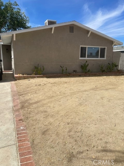 a house with trees in the background