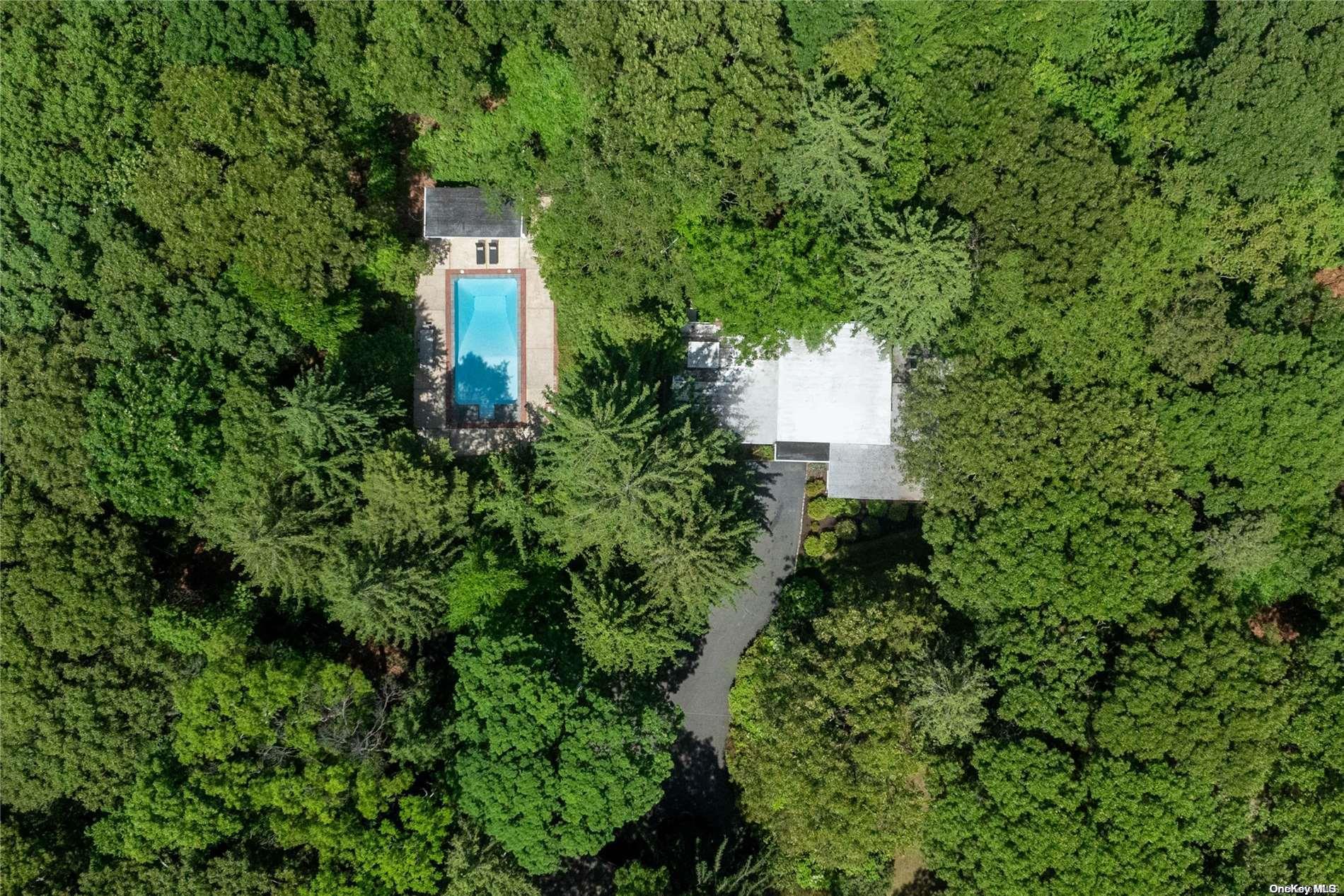 Aerial view of home & pool