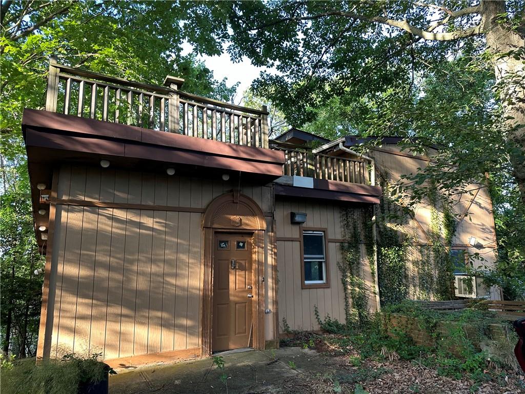 a view of a house with a balcony