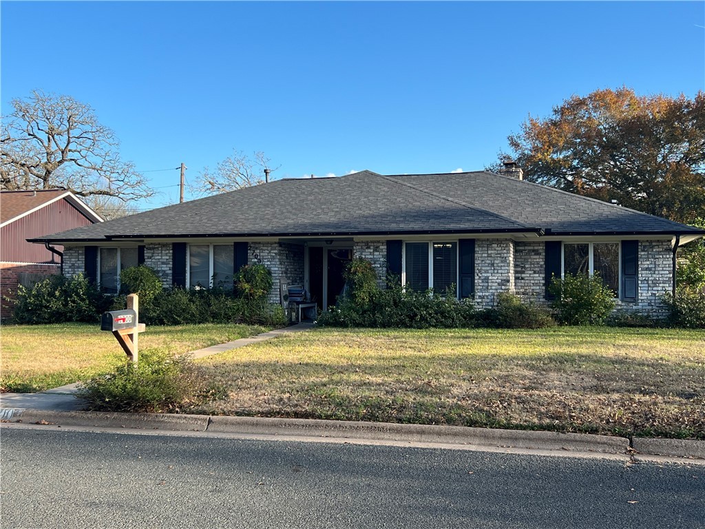 Ranch-style home on corner lot with side entry two