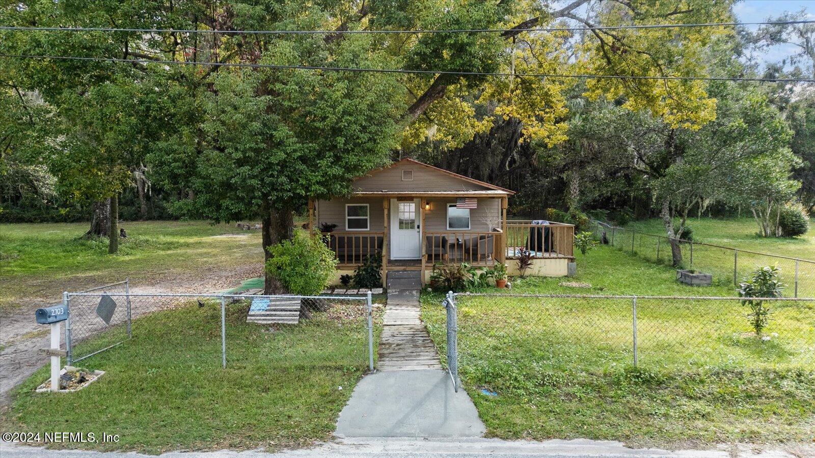 a house with garden in front of it