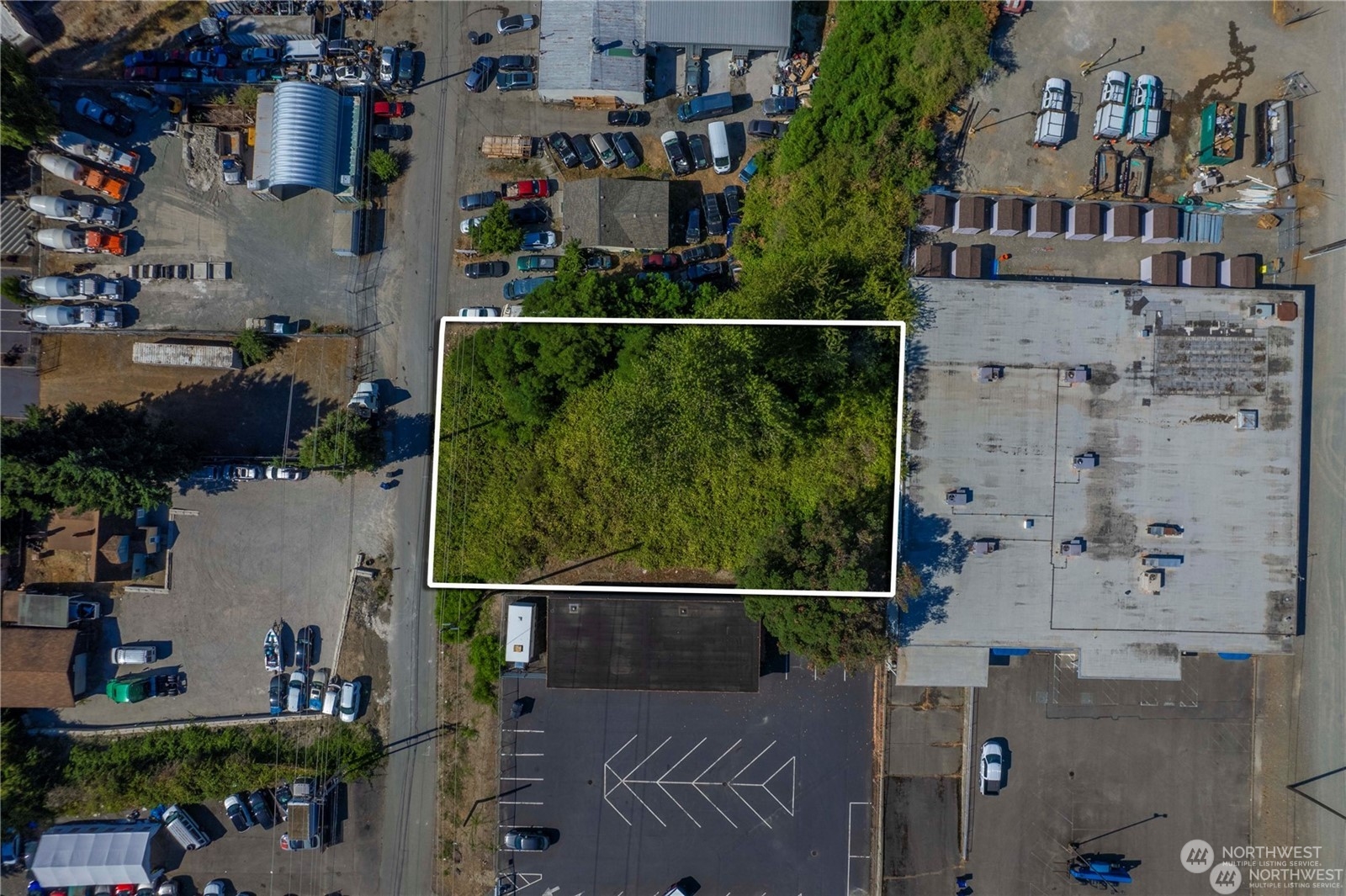 an aerial view of houses and roads