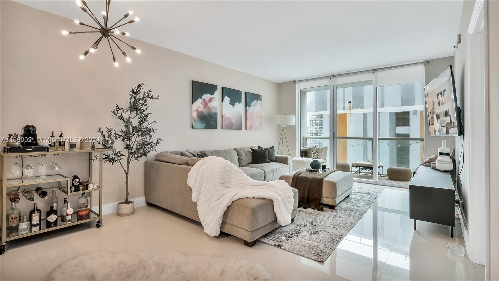 a living room with furniture and a window