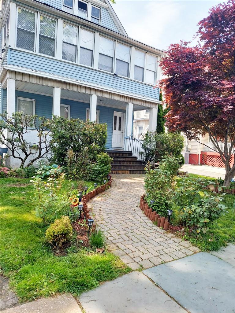 View of front of property with covered porch