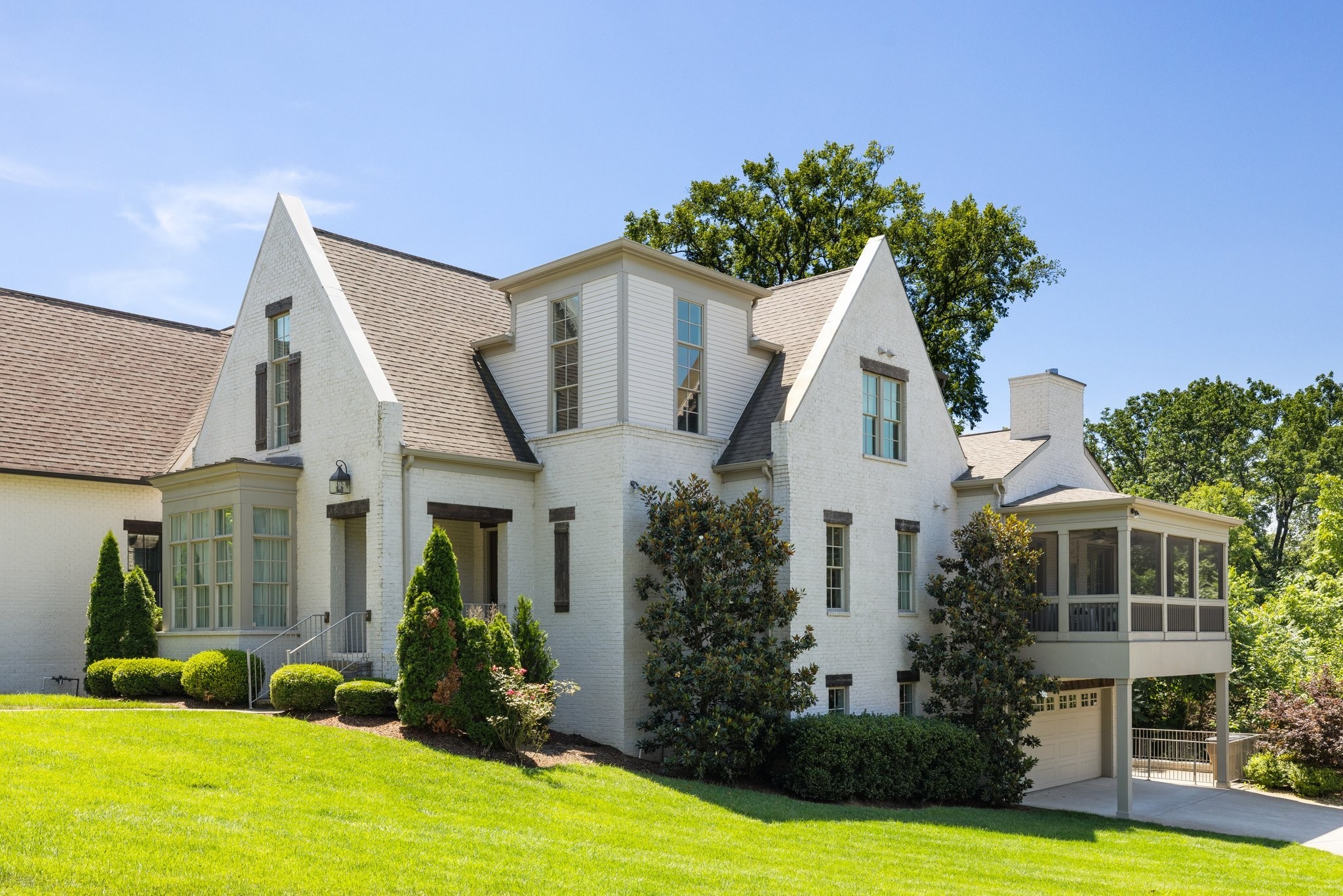 a view of house with swimming pool outdoor seating