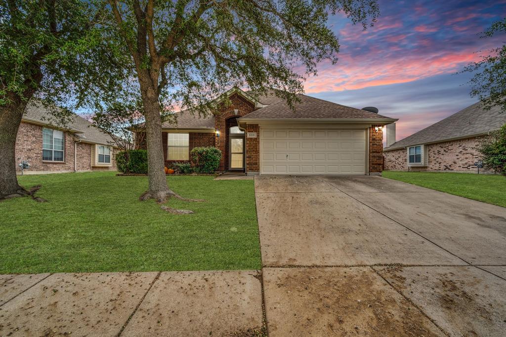 front view of house with a yard