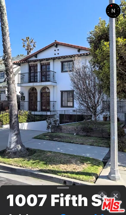 a front view of a house with yard