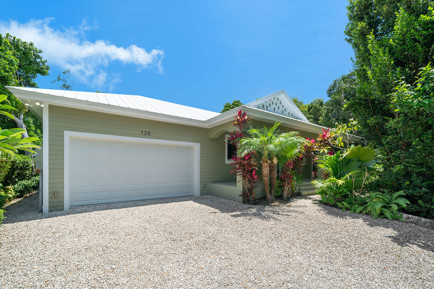 a view of a house with a garage