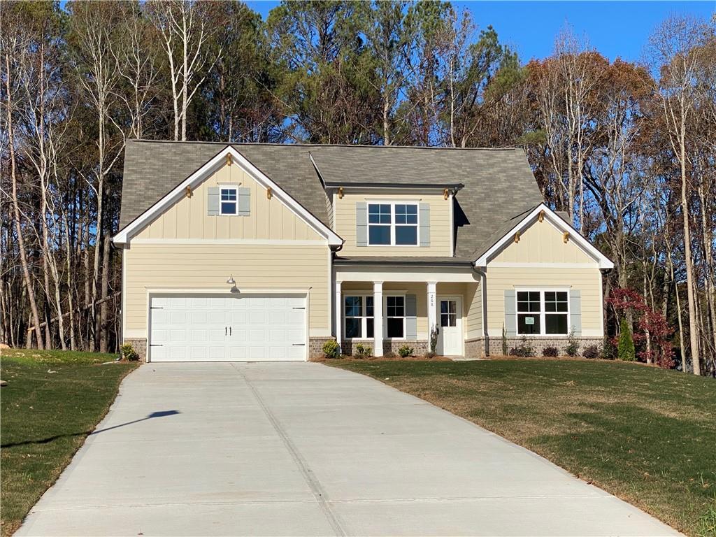 front view of a house with a yard