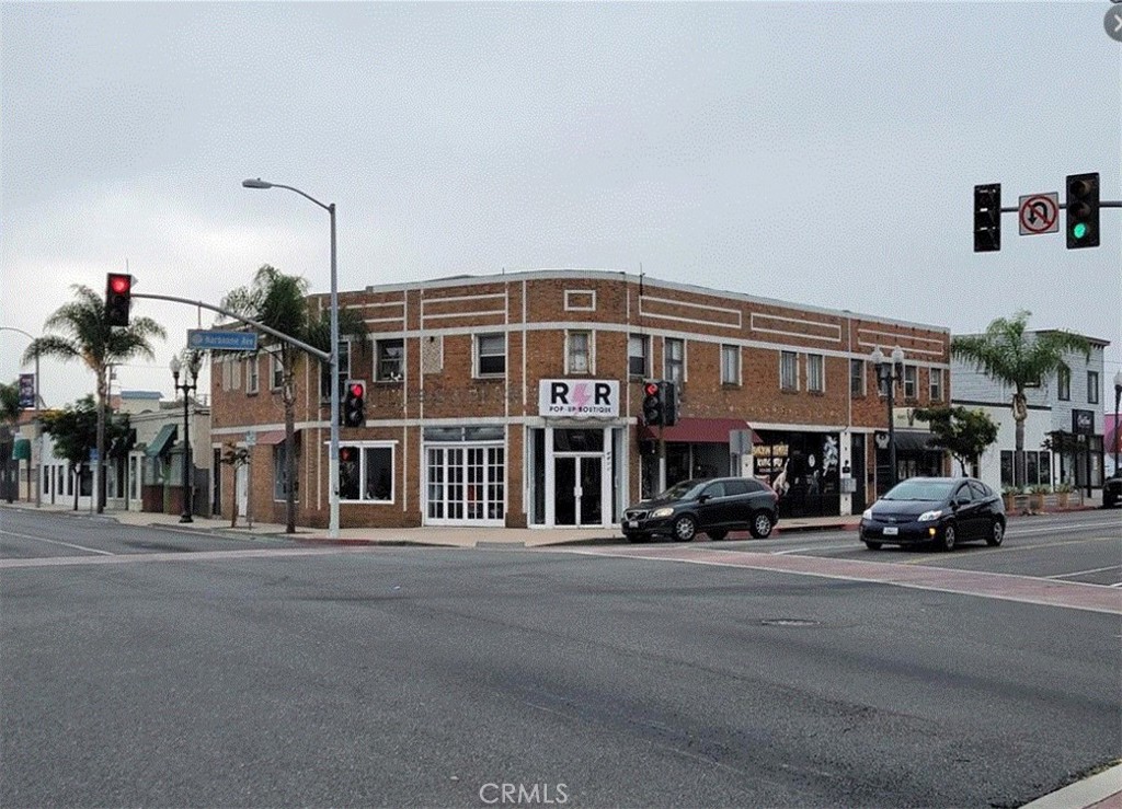 a front view of a building with a street