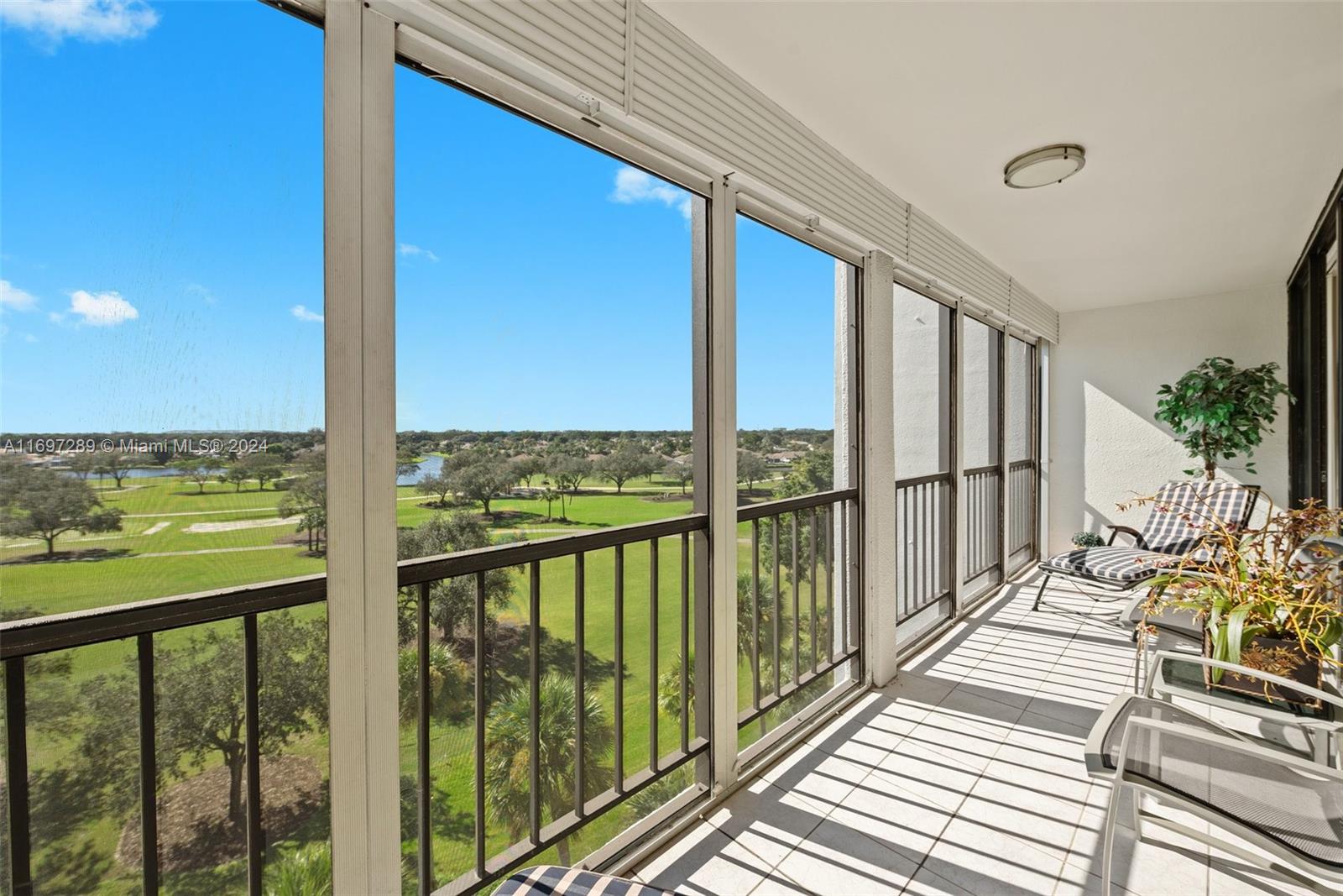 a view of balcony with wooden floor