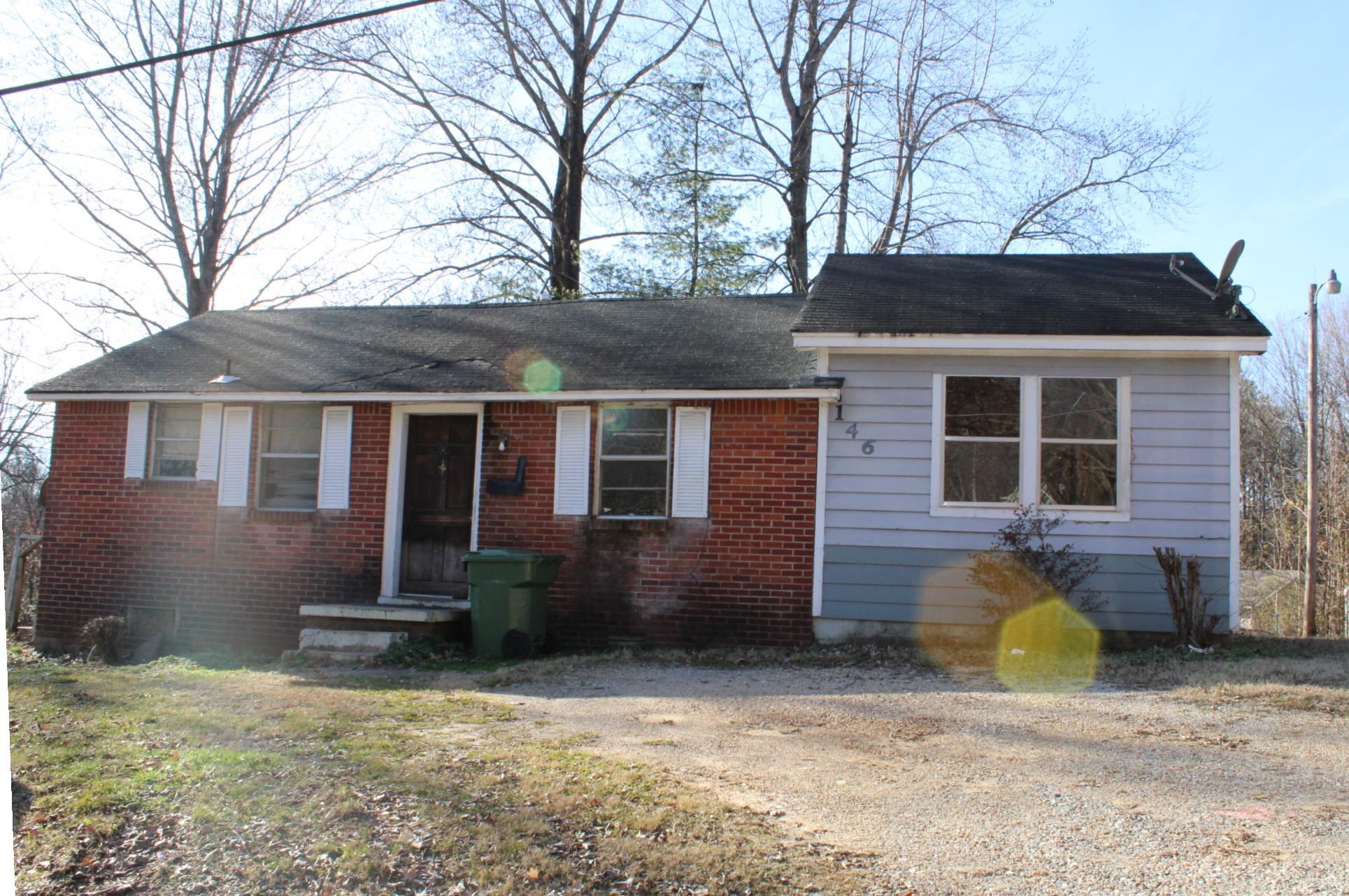 a front view of a house with patio