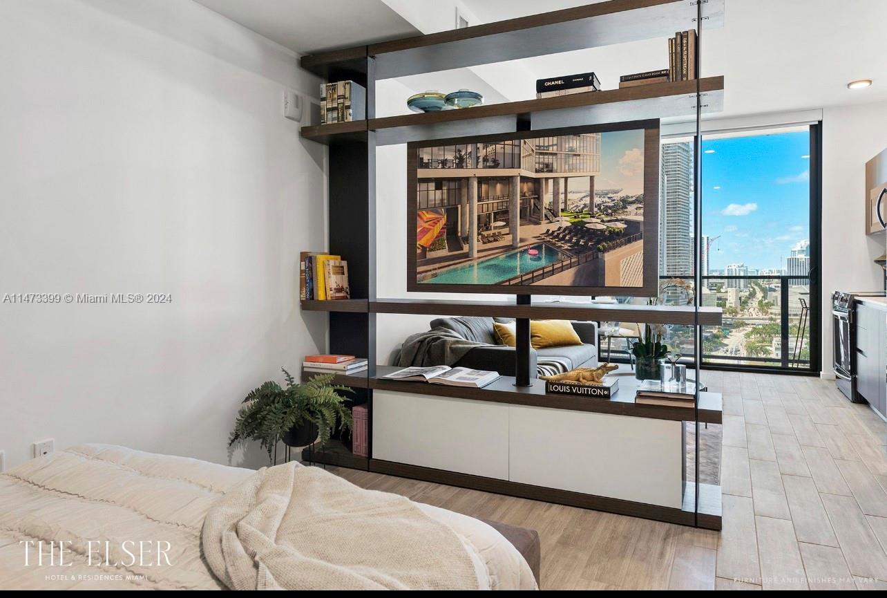 a living room with furniture and window