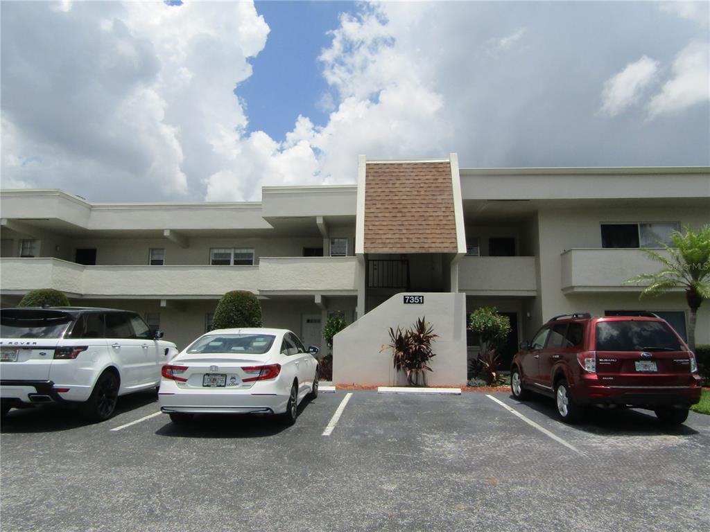 a car parked in front of a building