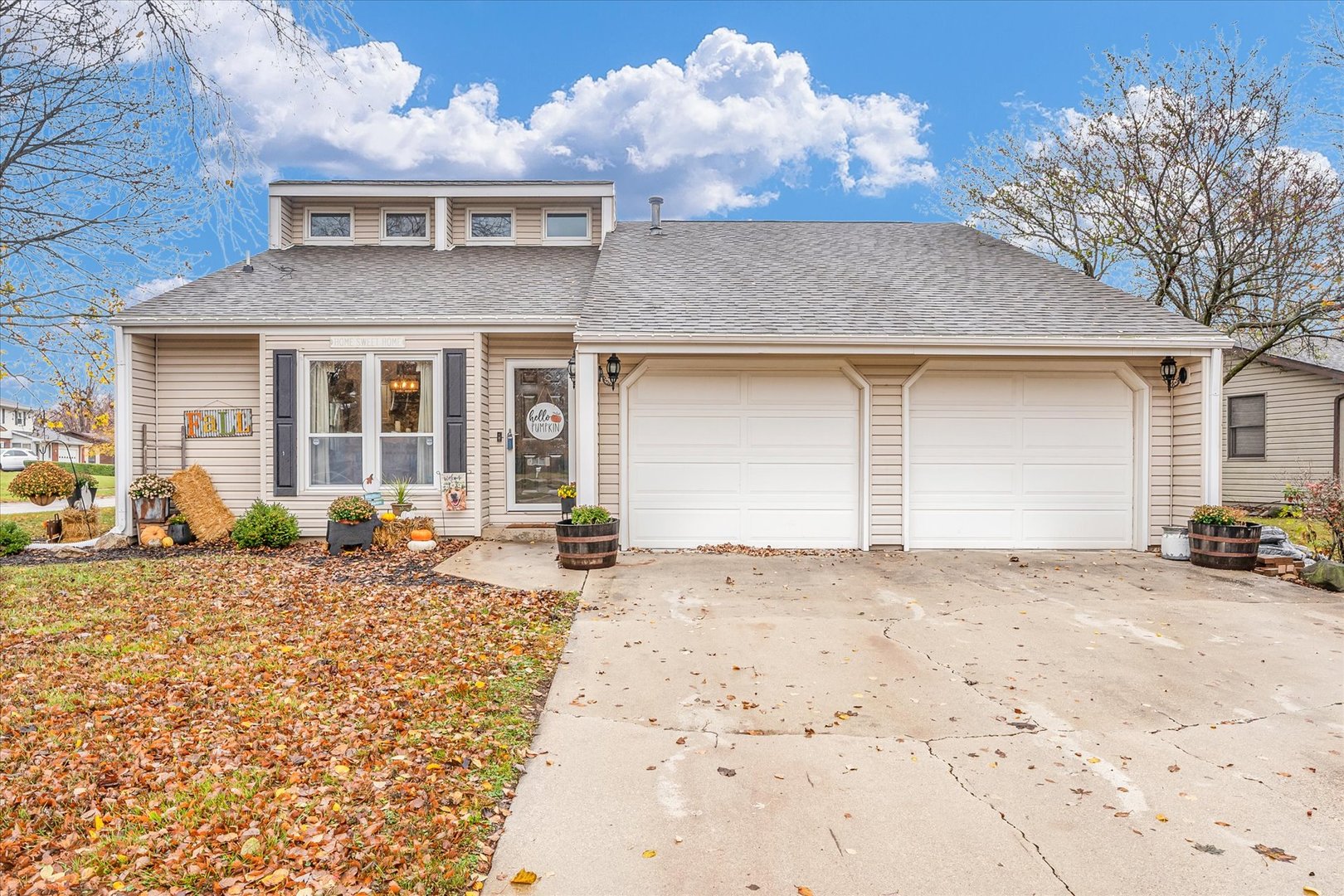 a front view of a house with a patio