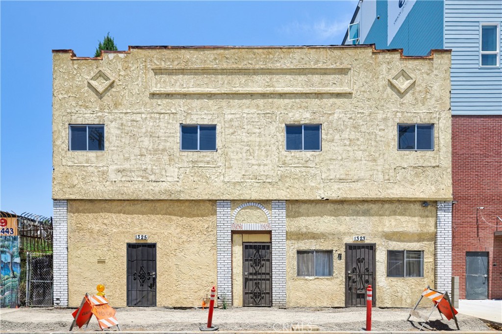 a view of a building with a street