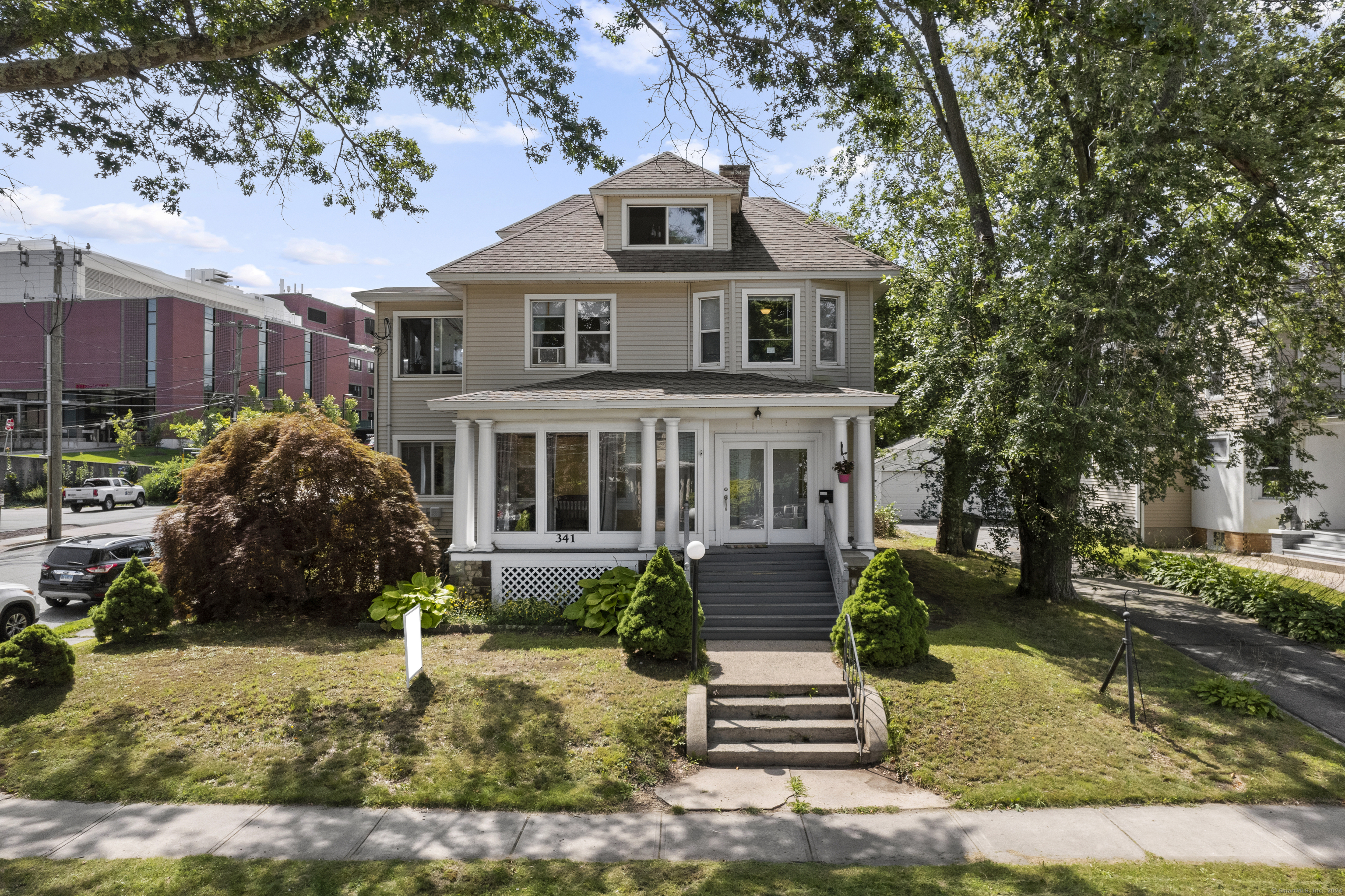 a front view of a house with a yard