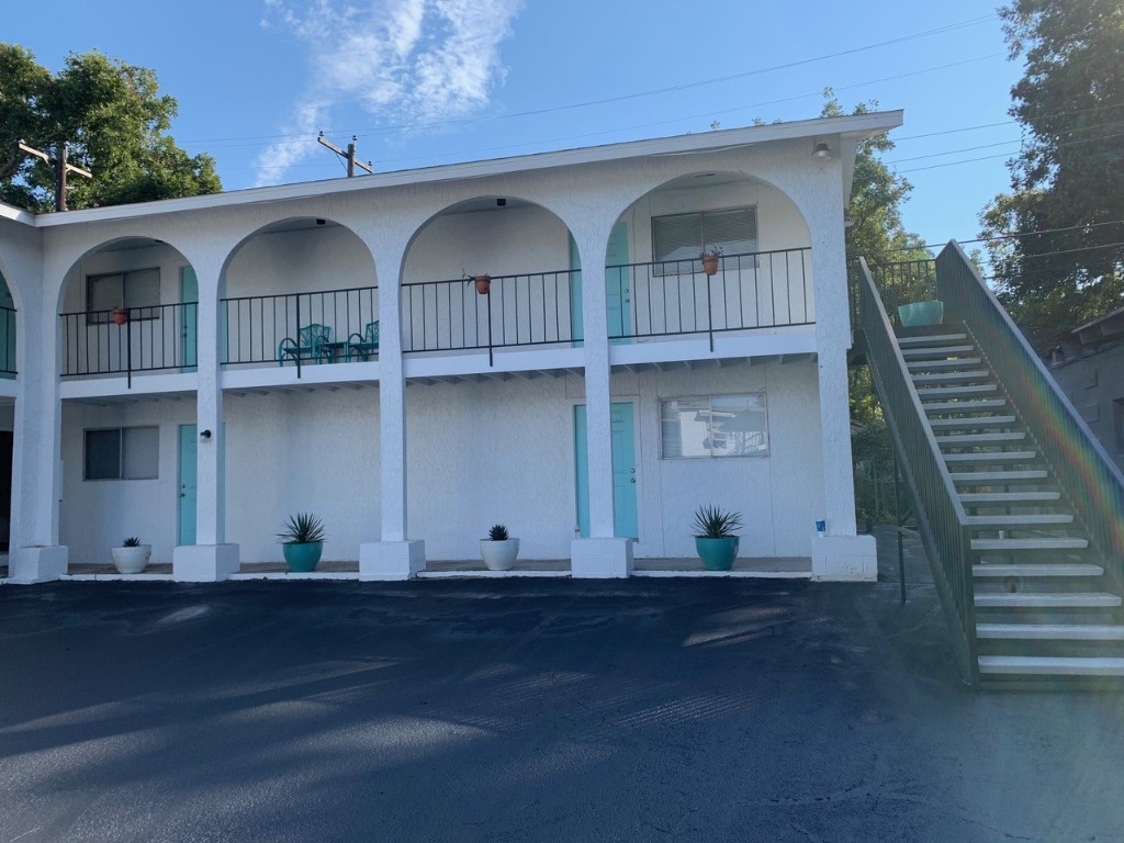 a front view of a house with garage