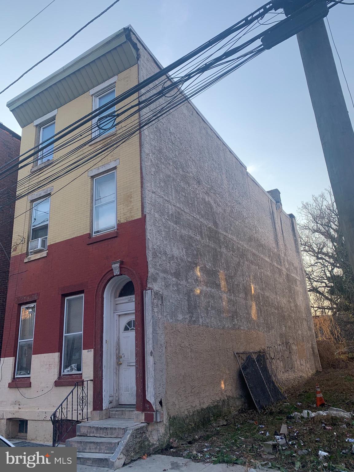 a brick building with a large windows