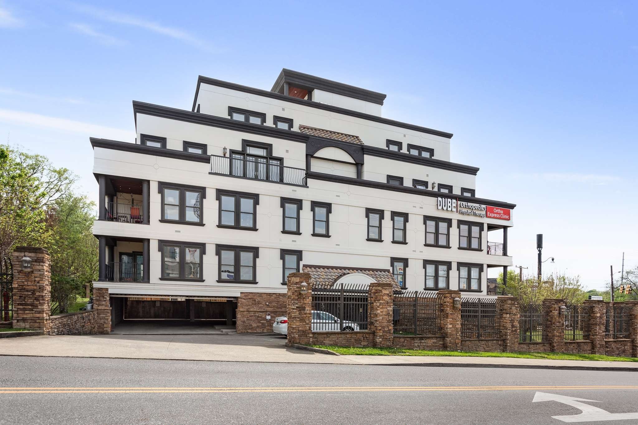 a front view of a building with street view