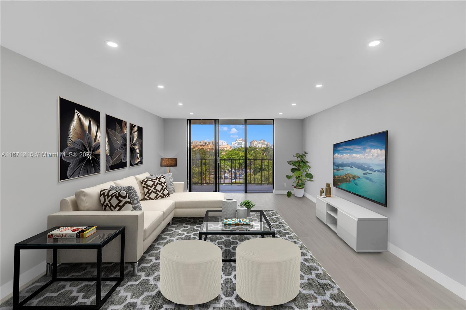 a living room with furniture and a flat screen tv