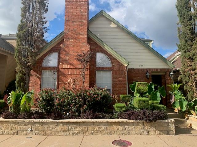 a house with a flower garden