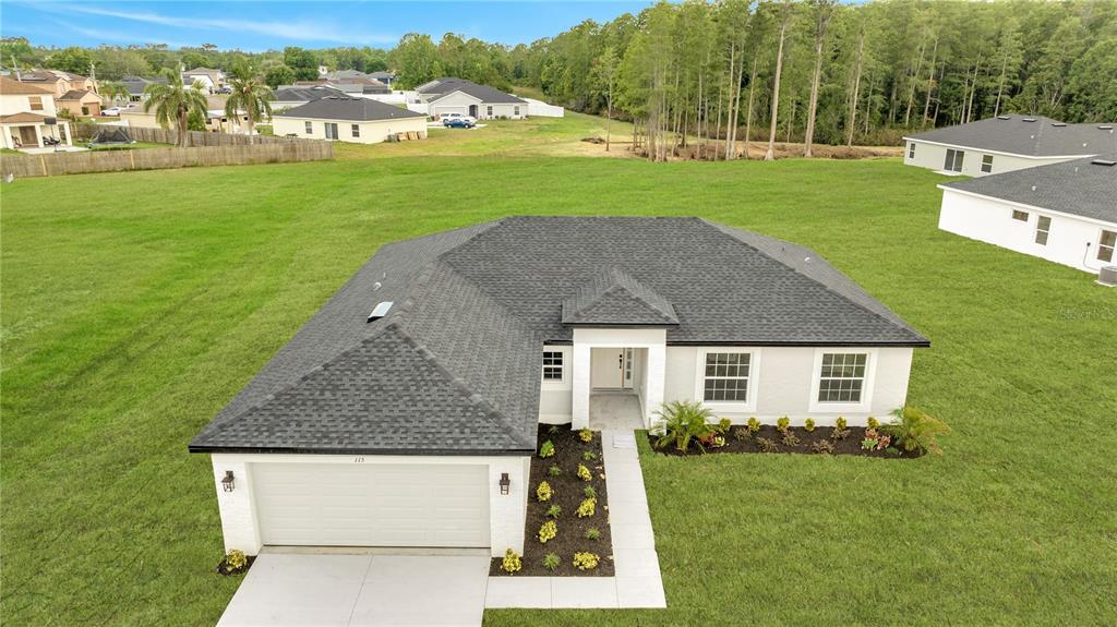 a house with garden in front of it