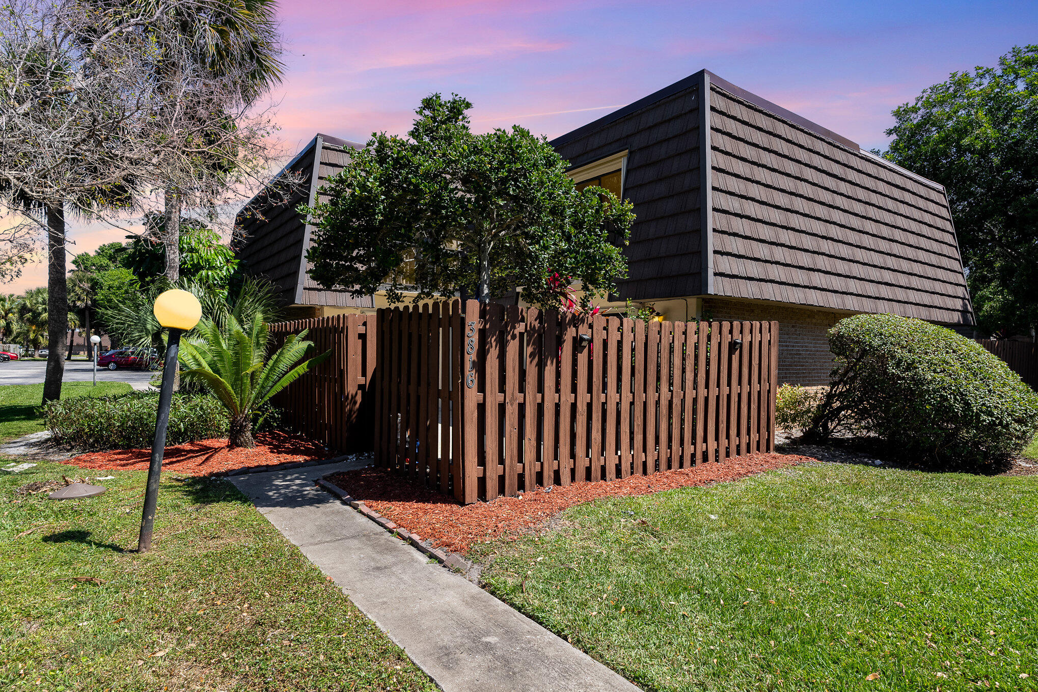 a front view of a house having yard