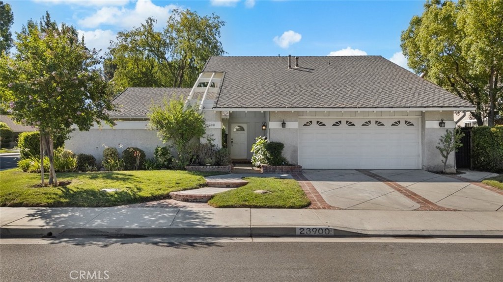 a house with yard in front of it