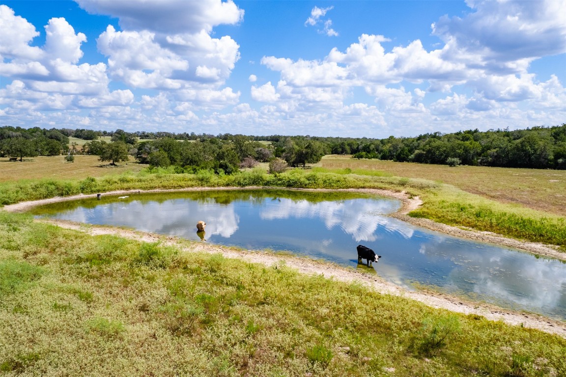 a view of a lake with a table in the background