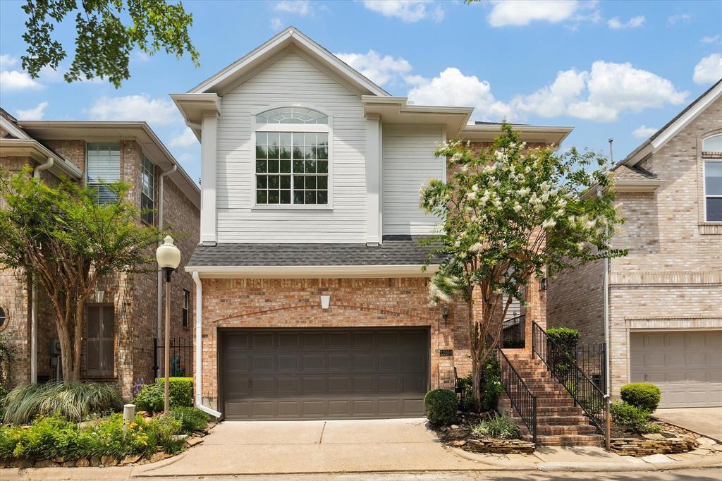 STUNNING LOW MAINTENANCE PATIO HOME WITH 2-CAR GARAGE AND PRETTY LANDSCAPING.