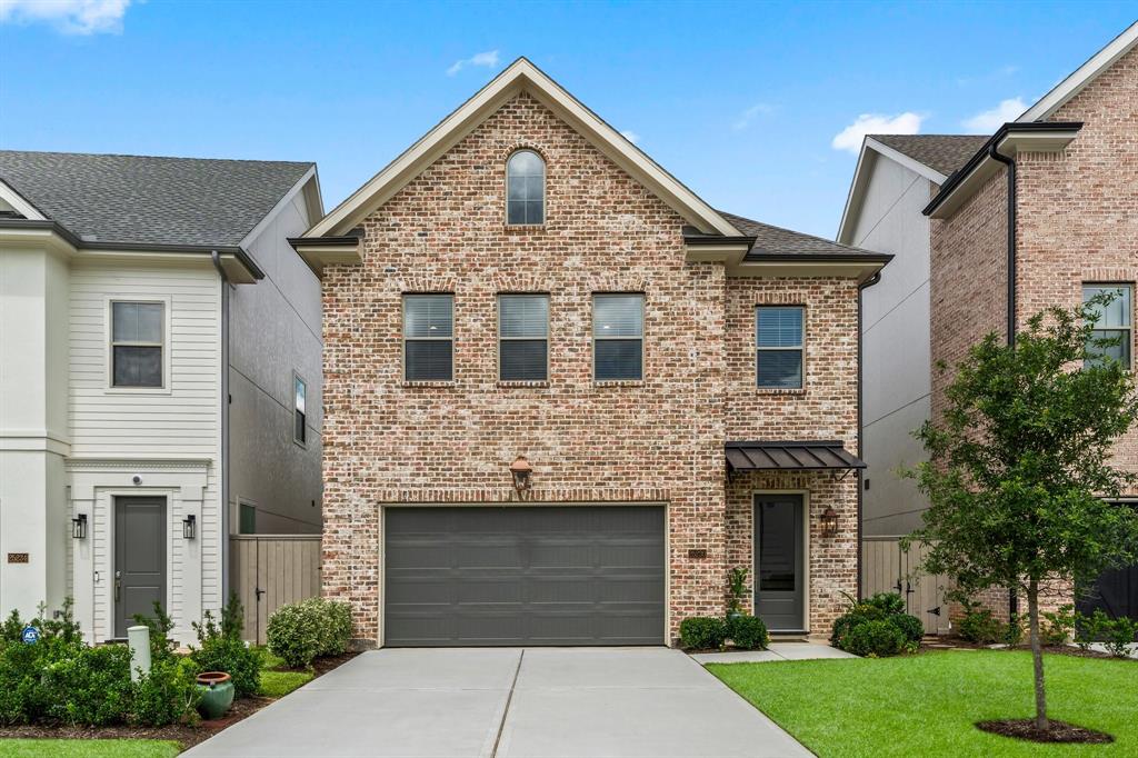 INDULGE in luxury living in this prestigious gated enclave of The Reserve at Woodmill Creek!