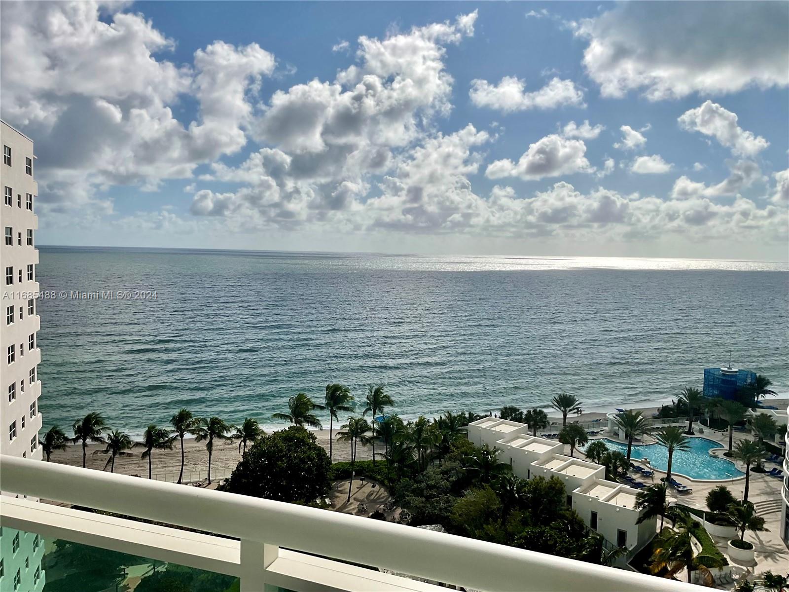 a view of a lake from a balcony