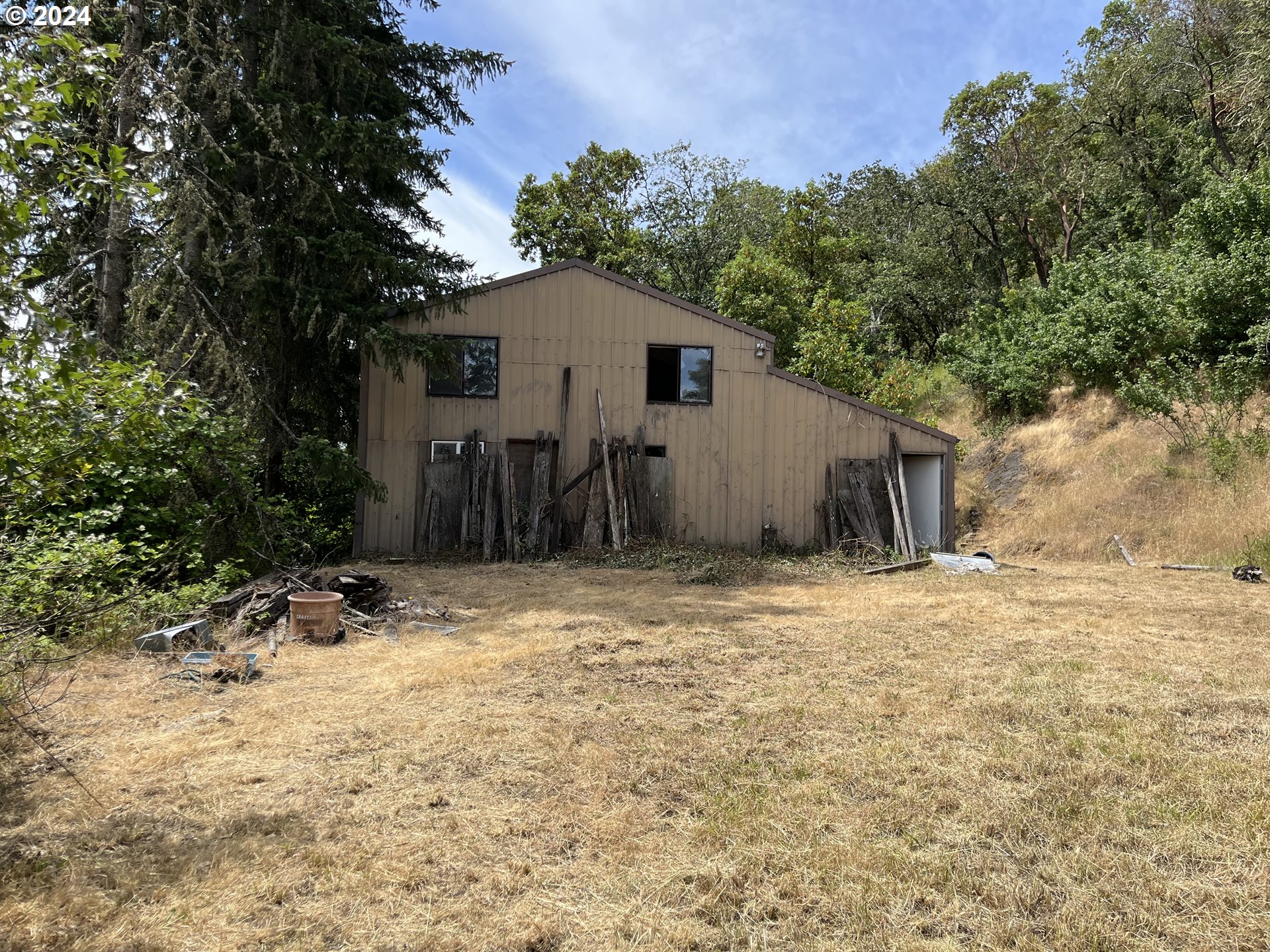 a house with trees in the background