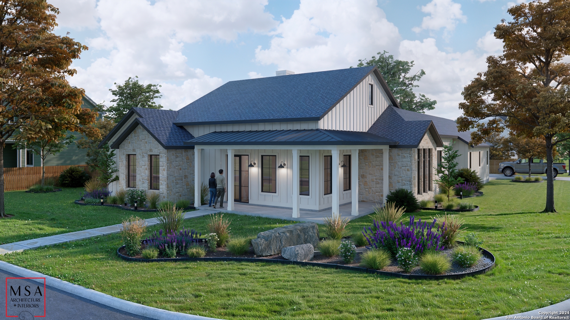 a front view of a house with a garden and yard