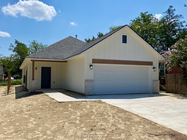 a house with a yard and parking space