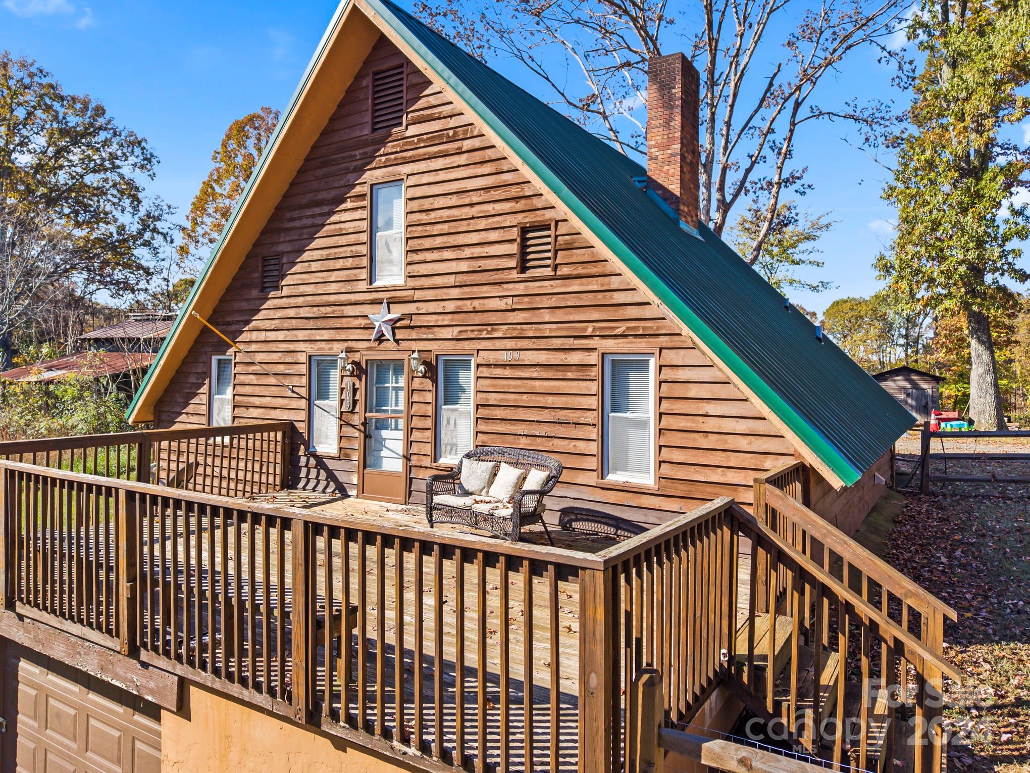 a view of a house with a deck