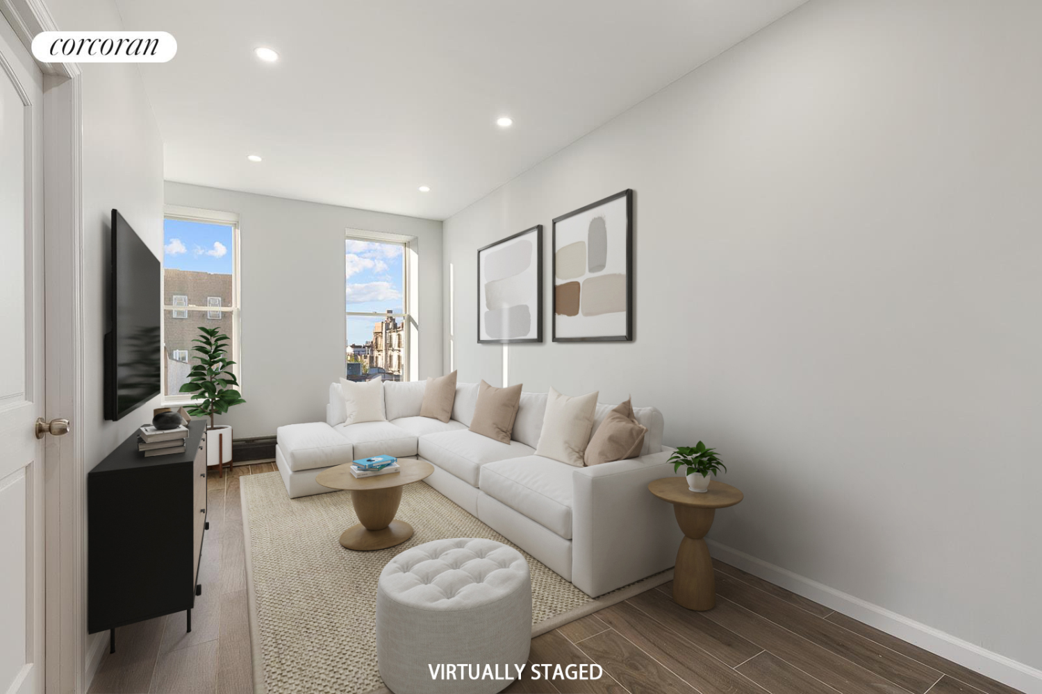 a living room with furniture and a flat screen tv